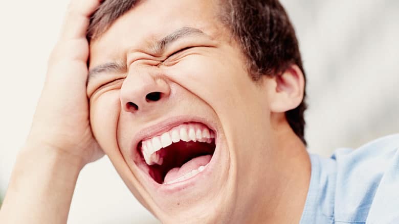 laughing-out-loud-young-man-face-closeup-outdoors-laughter-is-780x439.jpg